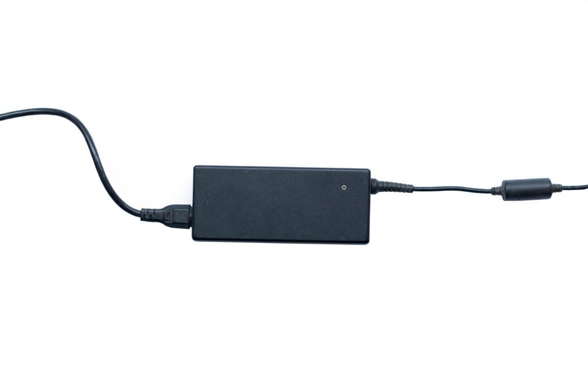 Laptop charger adapter isolated on white background